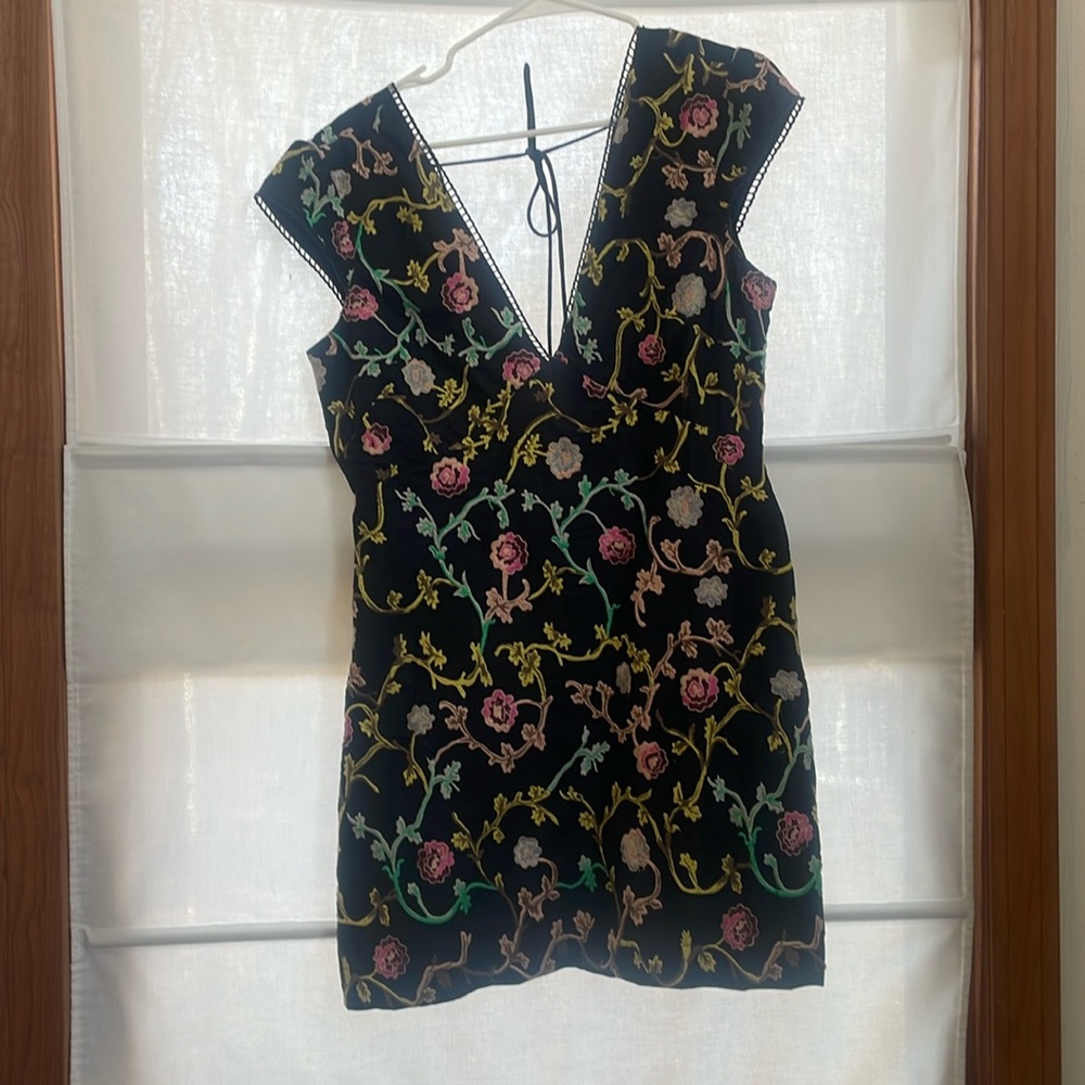 Worn once. Beautiful dress with perfect & timeless detail.